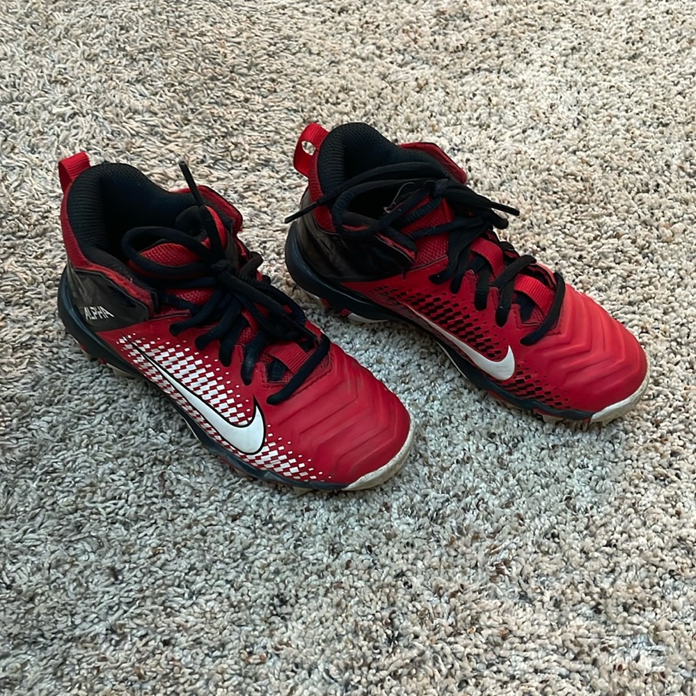 Red Nike Alpha football cleats size 12c